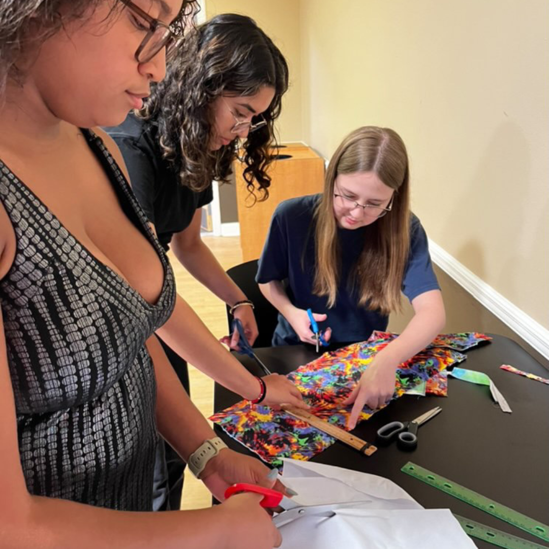 The PERIOD. Chapter at the University of Central Florida making reusable pads to donate in collaboration with Days for Girls