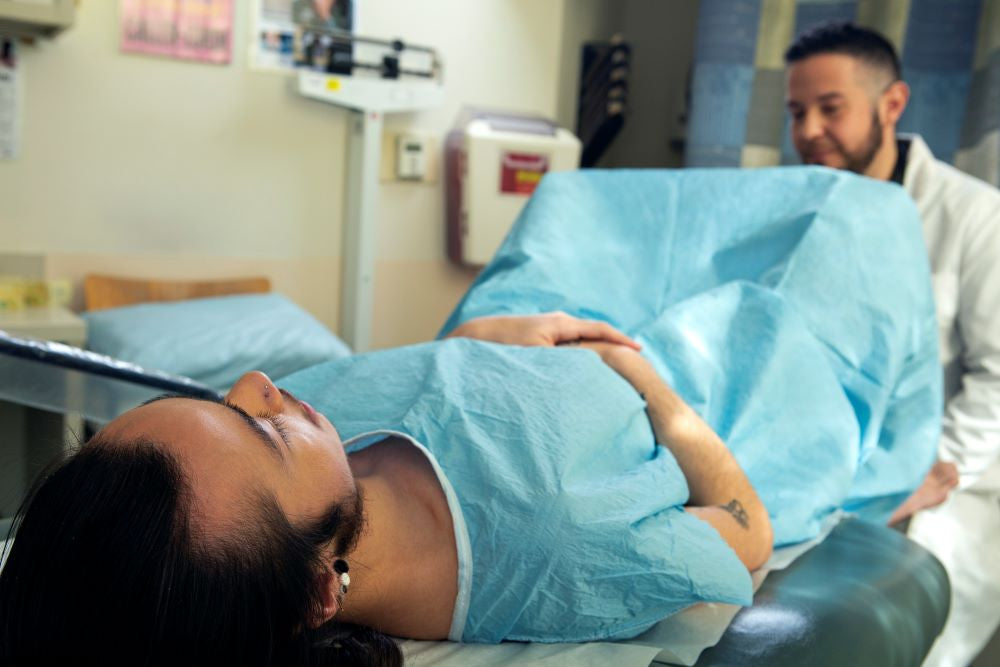 genderqueer person receiving pelvic exam
